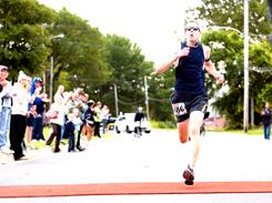 Allan MacKenzie of Coxheath crosses the
              finish line to win the Cape Breton Fiddlers Run marathon
              in Sydney, Sunday, in a time of two hours, 51 minutes and
              34 seconds. Steve Wadden - Cape Breton Post